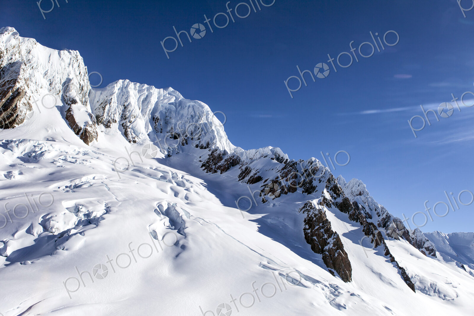 Snow on sunny mountain