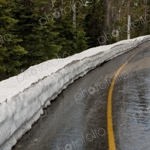 Snow piled up by rural road Snow piled up by rural road