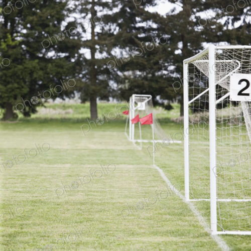 Soccer goal nets on soccer field.