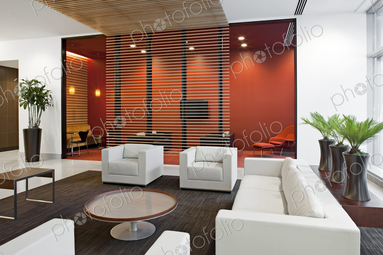 Sofa and chairs in office waiting area