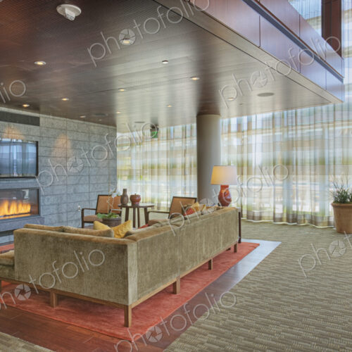 Sofa and fireplace in lobby