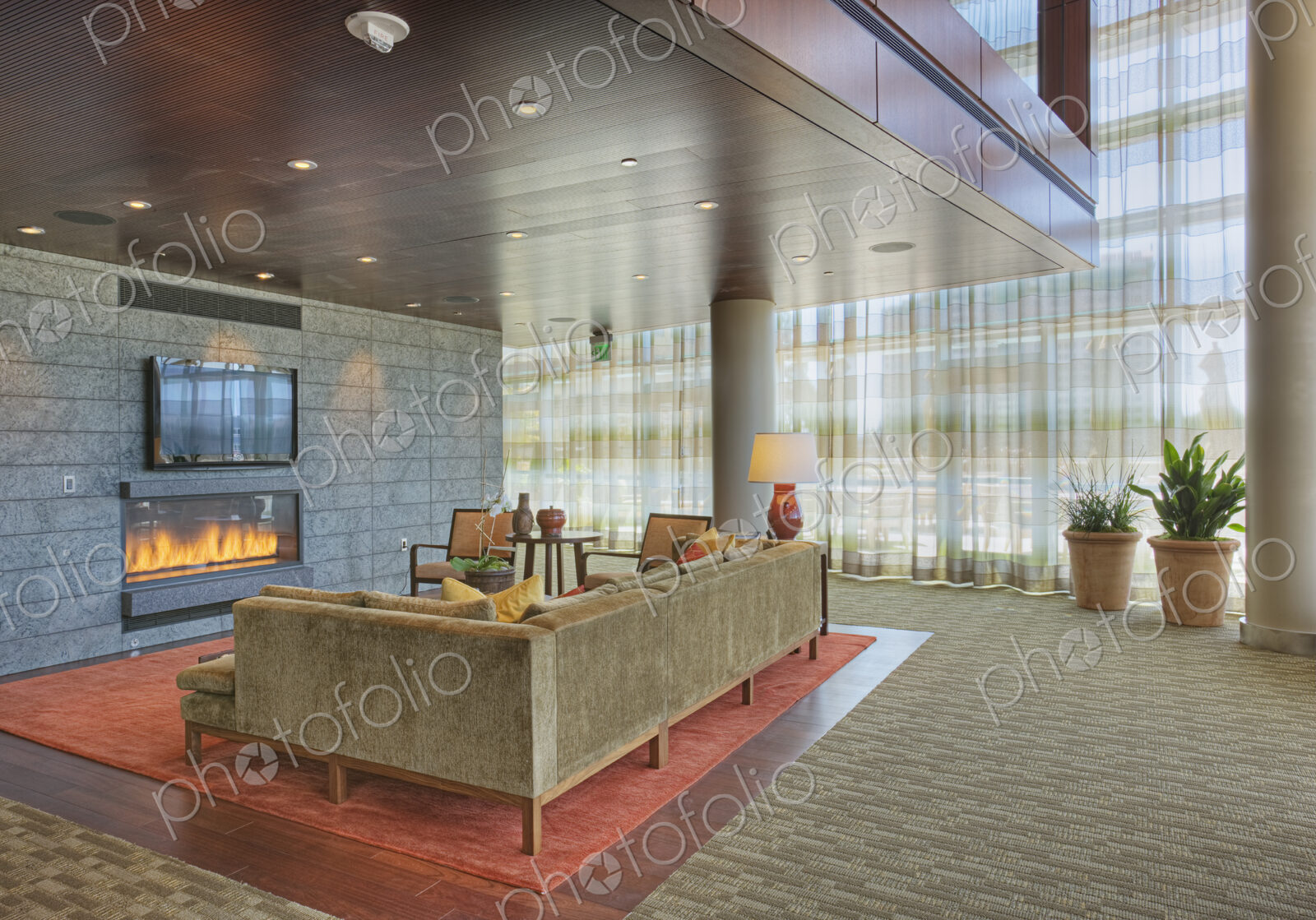 Sofa and fireplace in lobby