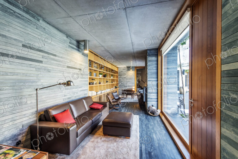 Sofa and glass wall in modern room