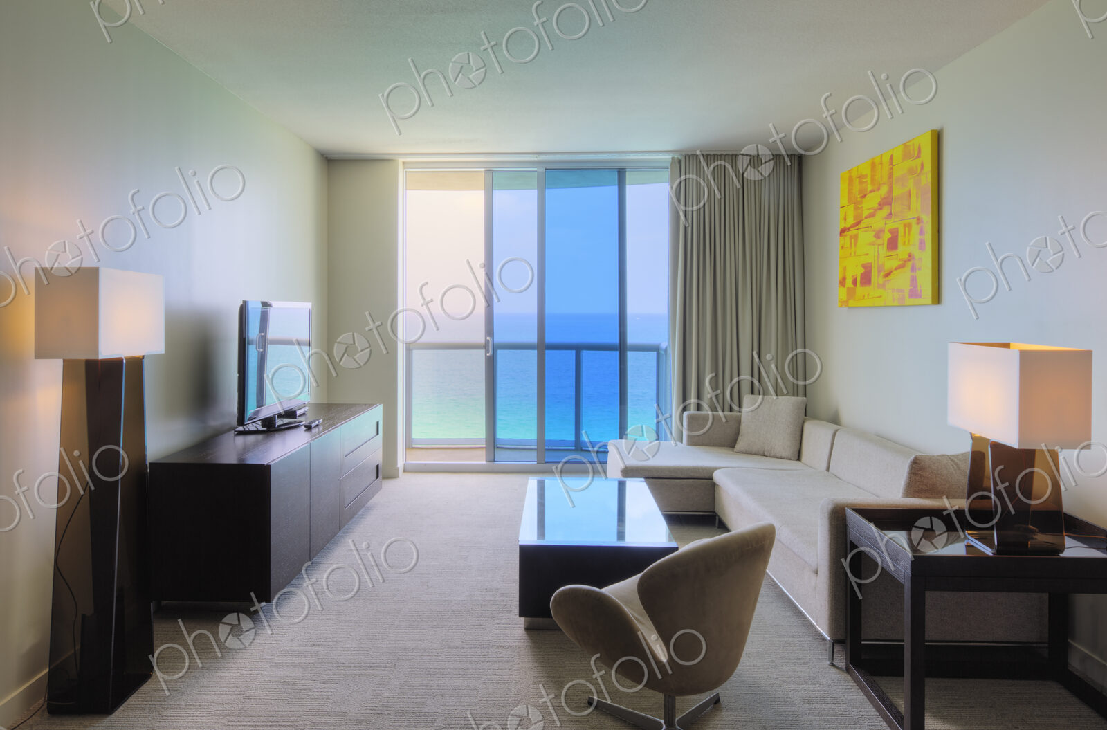Sofa and television in hotel room