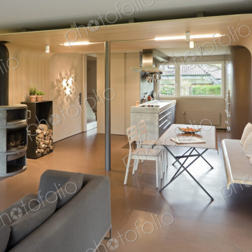 Sofa, dining table and chairs in modern home Sofa, dining table and chairs in modern home