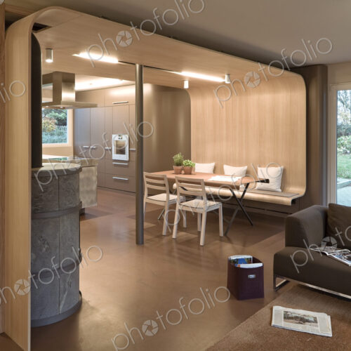 Sofa, dining table and chairs in modern home Sofa, dining table and chairs in modern home