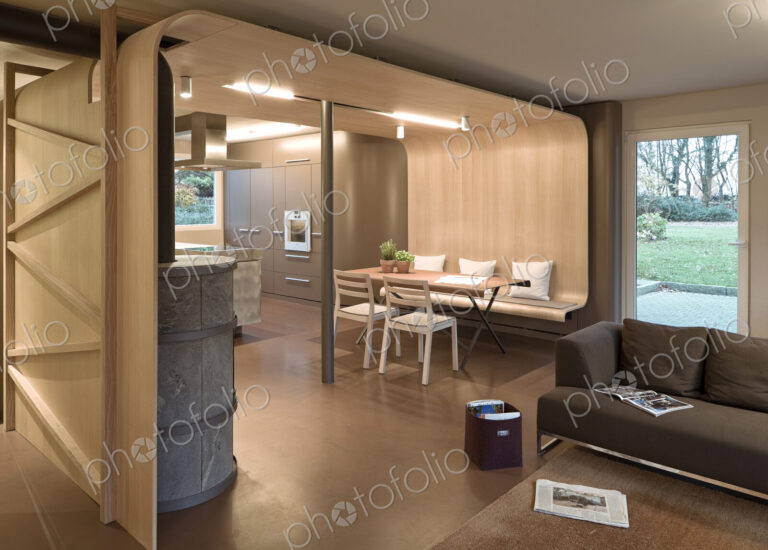 Sofa, dining table and chairs in modern home