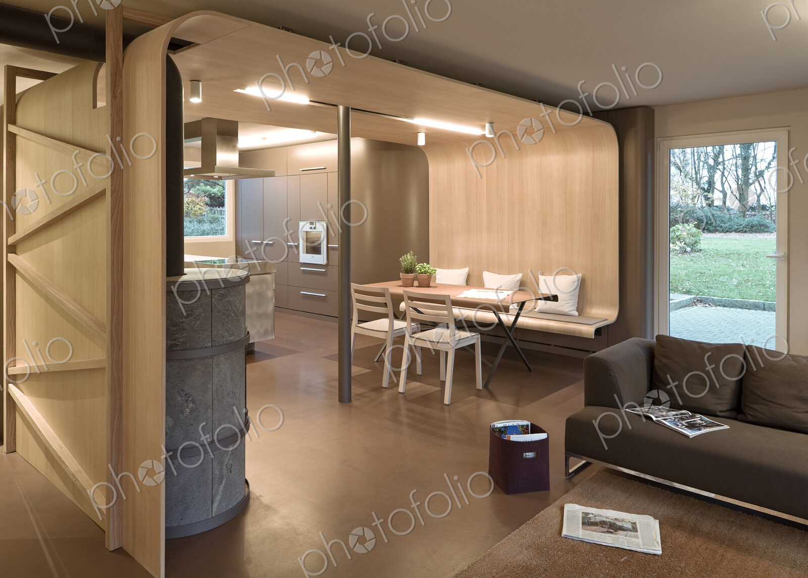 Sofa, dining table and chairs in modern home