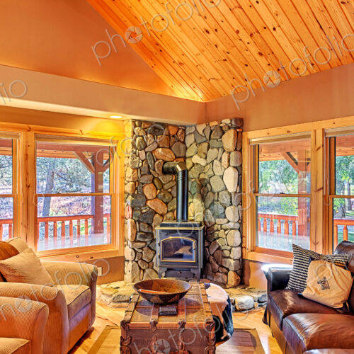 Sofas and fireplace in rustic living room