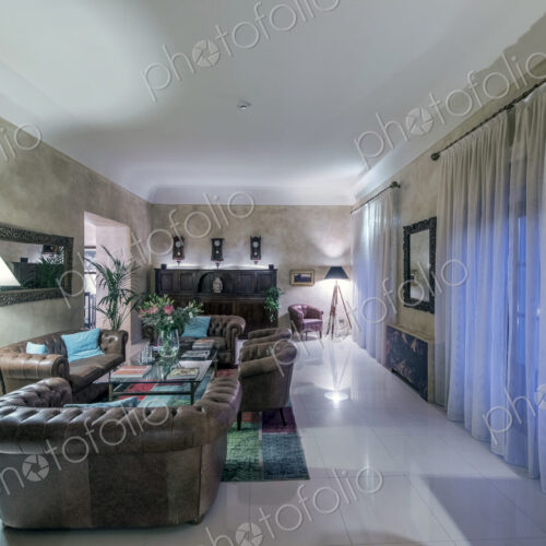 Sofas and windows in modern hotel lounge Sofas and windows in modern hotel lounge