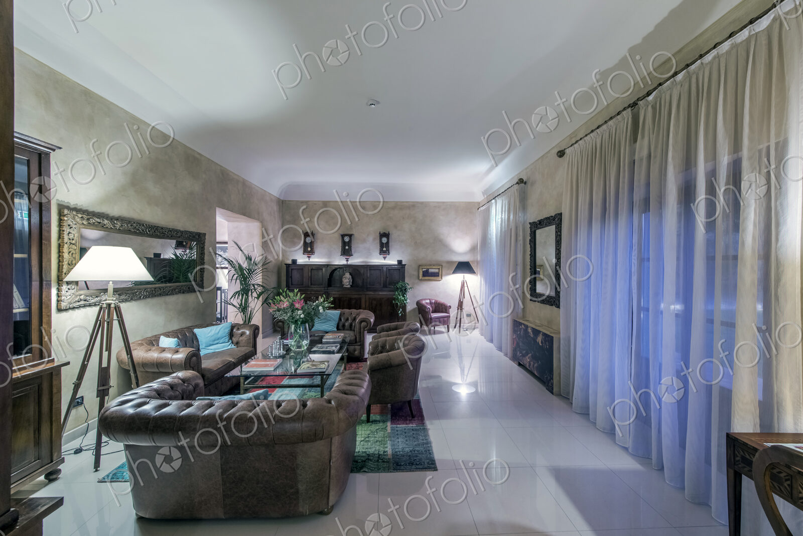 Sofas and windows in modern hotel lounge