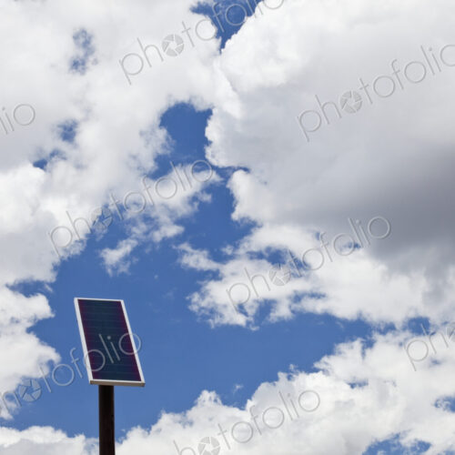 Solar Panel Under a Cloudy Sky