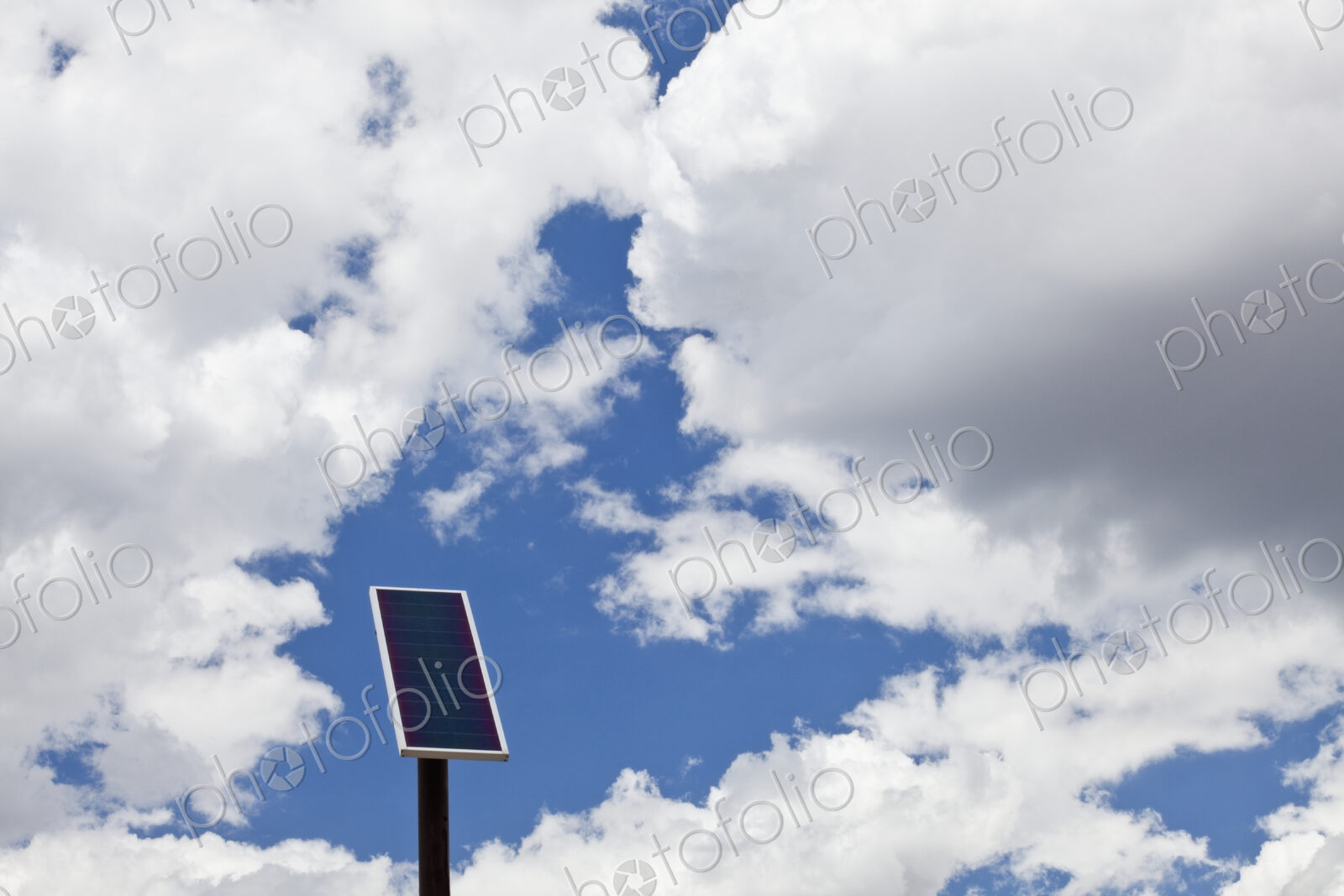 Solar Panel Under a Cloudy Sky