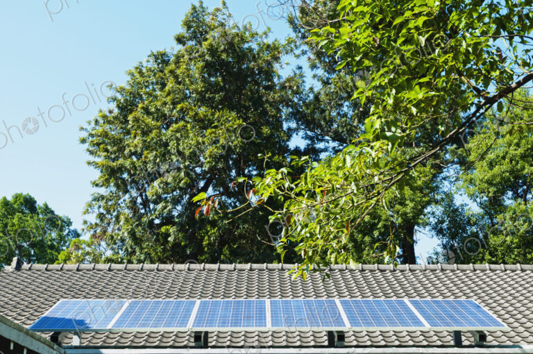 Solar energy panels on a traditional Chinese roof. Providing stored solar green energy,