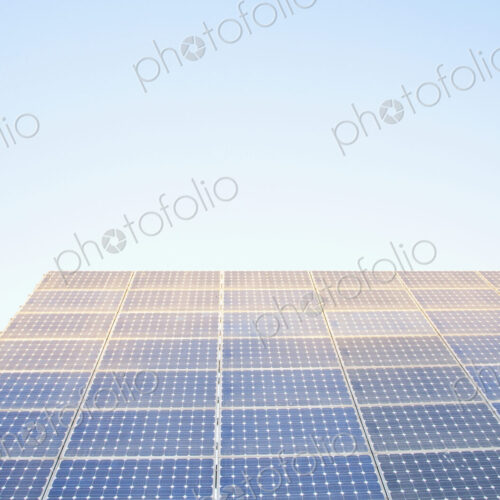 Solar panels against blue sky