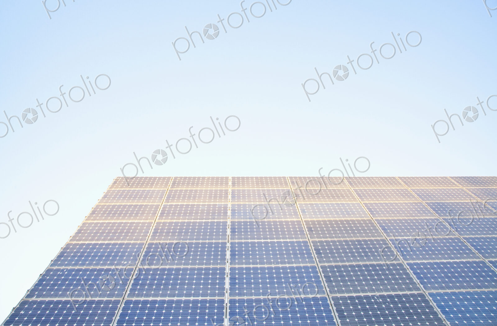 Solar panels against blue sky
