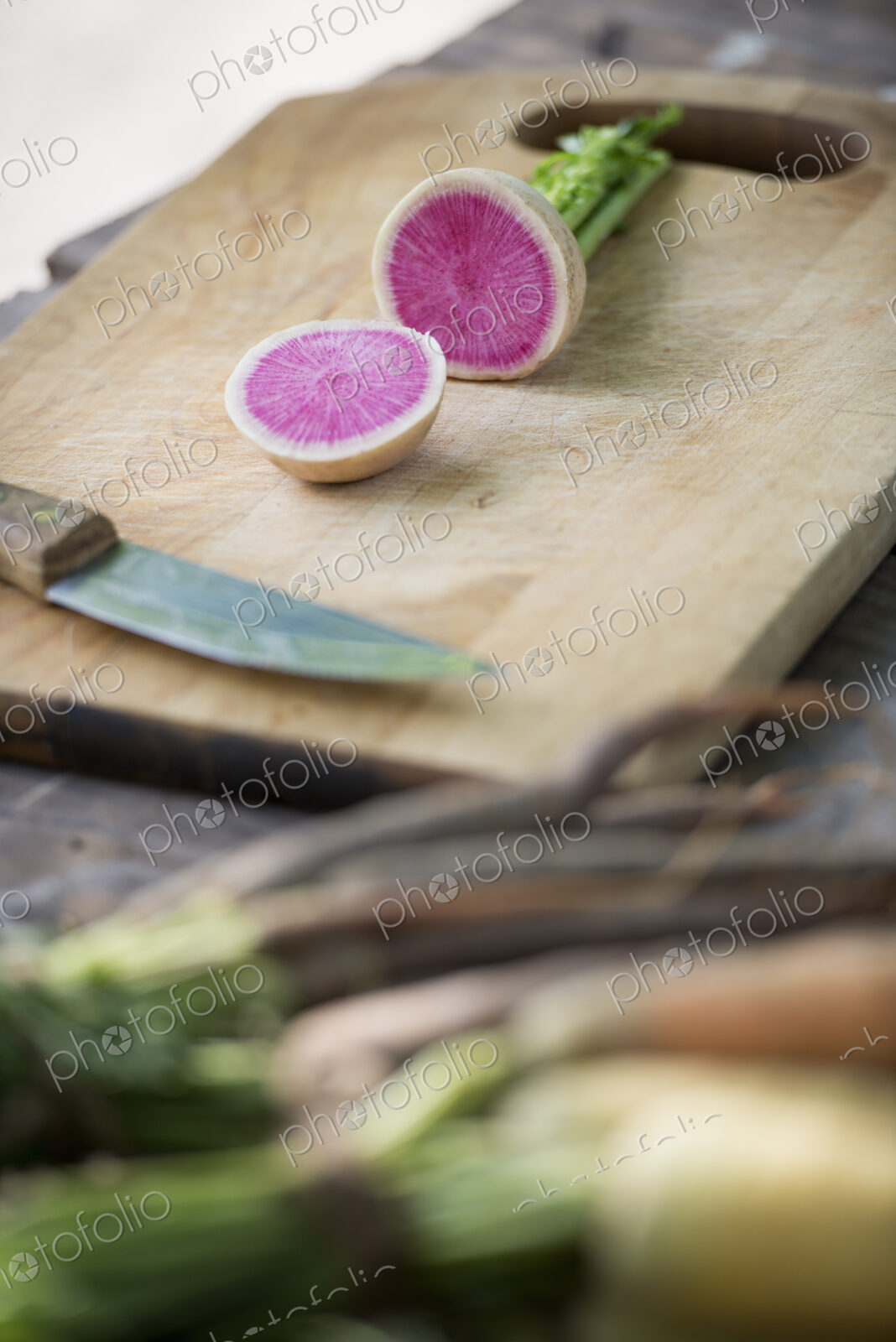 Sorting and chopping freshly picked summer vegetables and fruits.