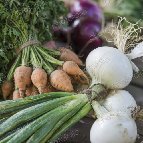 Sorting and chopping freshly picked vegetables and fruits. Sorting and chopping freshly picked vegetables and fruits.