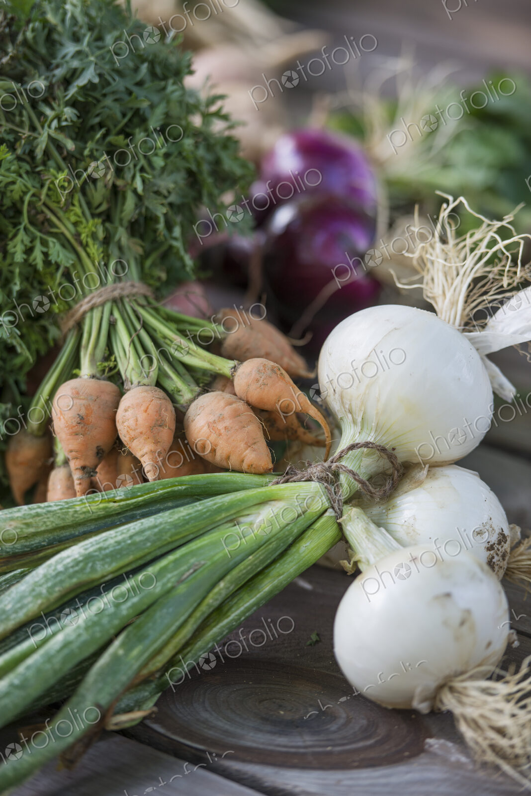 Sorting and chopping freshly picked vegetables and fruits.