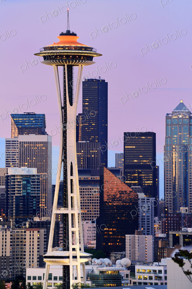 Space Needle and high rise buildings in Seattle city skyline at sunset, Washington,…