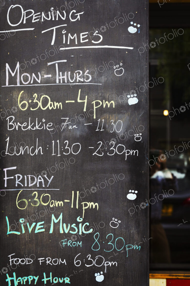 Specialist coffee shop. A chalk board with opening times and events listed.