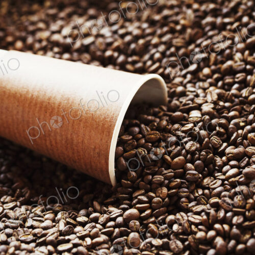Specialist coffee shop. A sack of roasted beans and a cardboard cup. Specialist coffee shop. A sack of roasted beans and a cardboard cup.