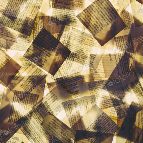 Squares of overlapping pieces of paper from old books, lit from below. Printed pages,…