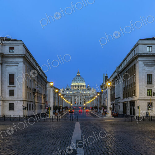 St Peter's Basilica and buildings illuminated at night, Rome, Italy St Peter's Basilica and buildings illuminated at night, Rome, Italy