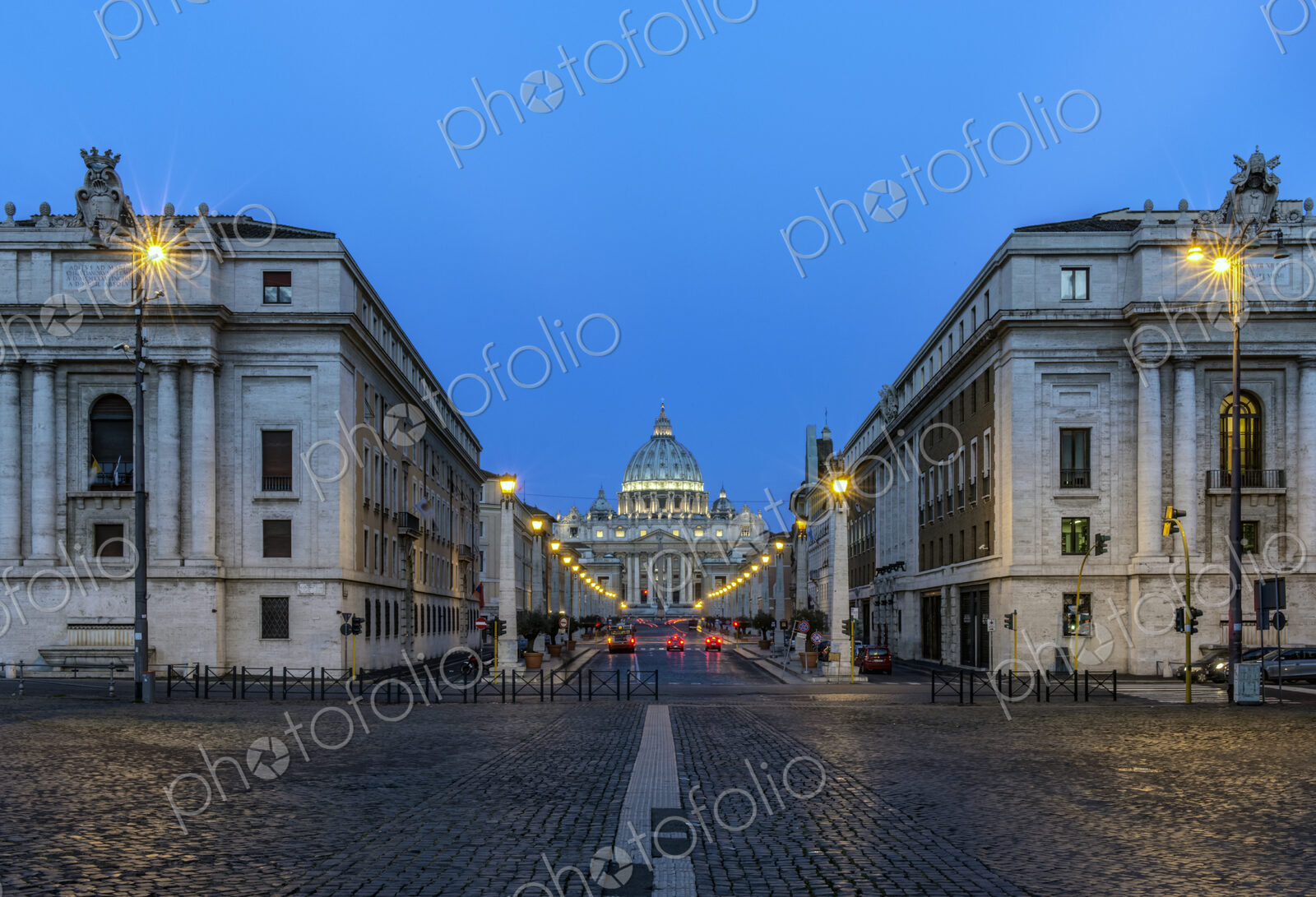 St Peter’s Basilica and buildings illuminated at night, Rome, Italy