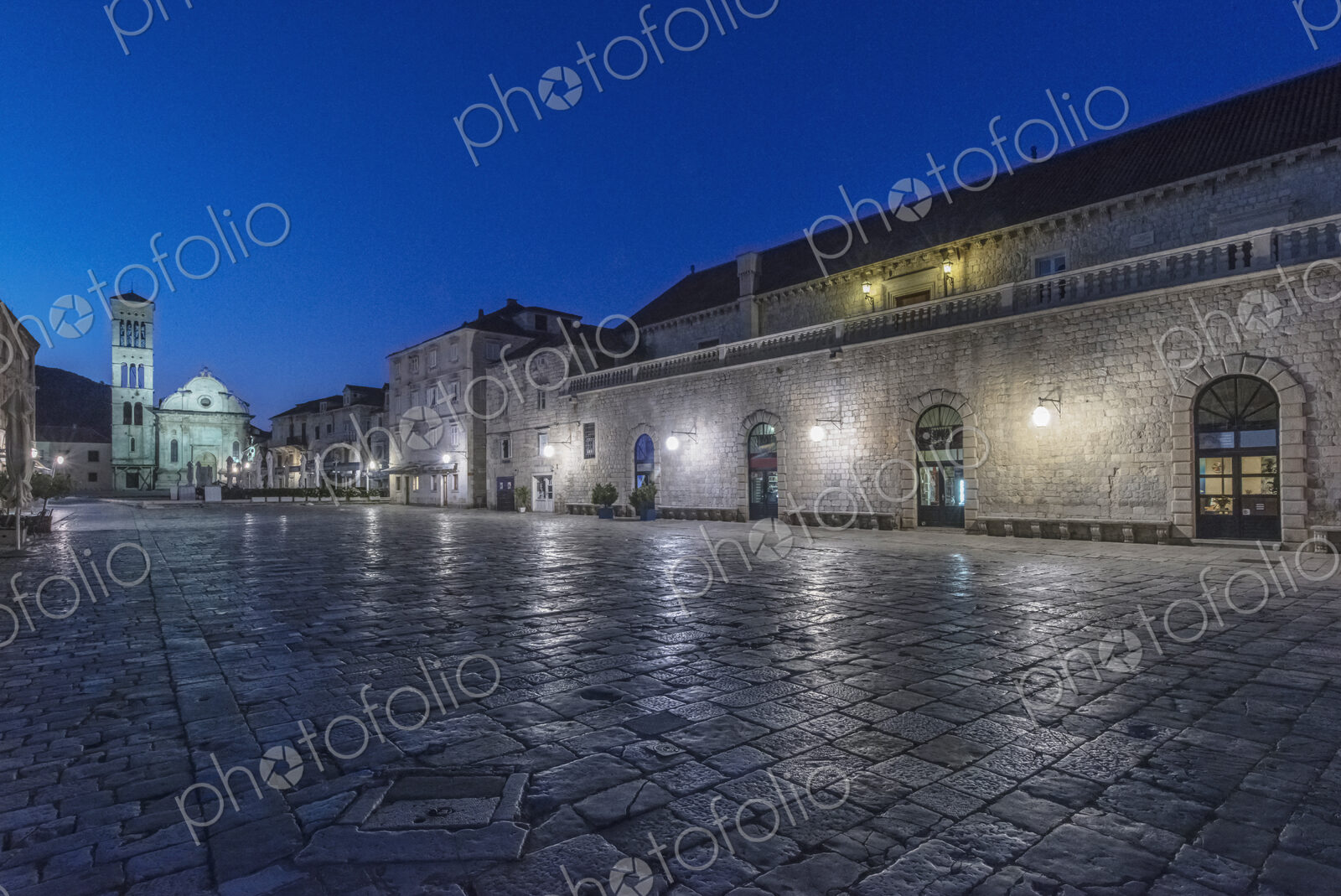 St. Stephen’s Square in Hvar lit up at night.