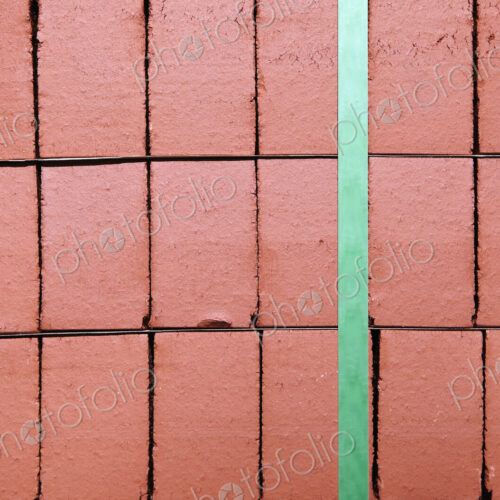 Stack of Red Bricks Bound Together