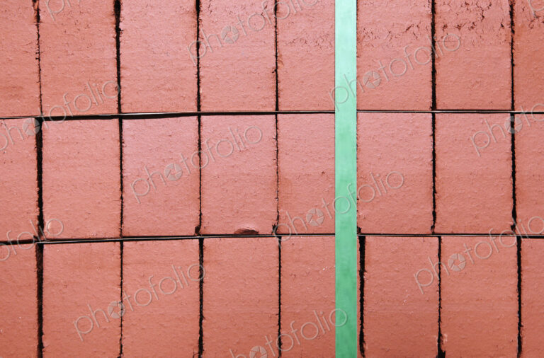 Stack of Red Bricks Bound Together