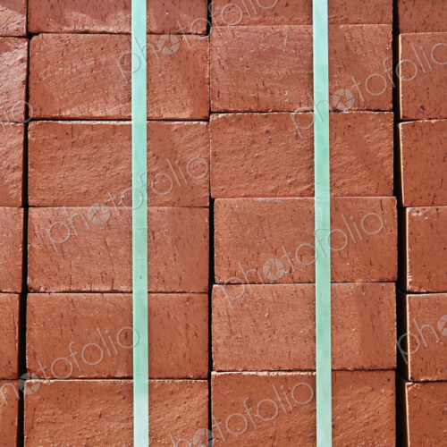 Stack of Red Bricks Bound Together
