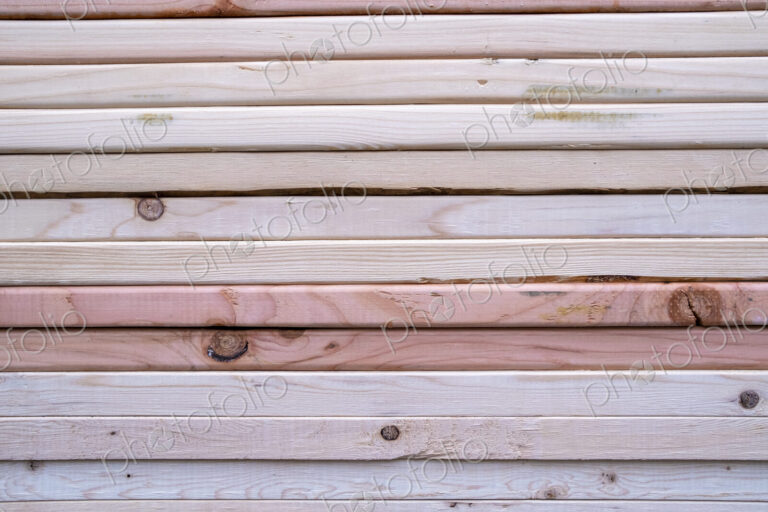 Stack of pine 2x4 lumber used for building construction