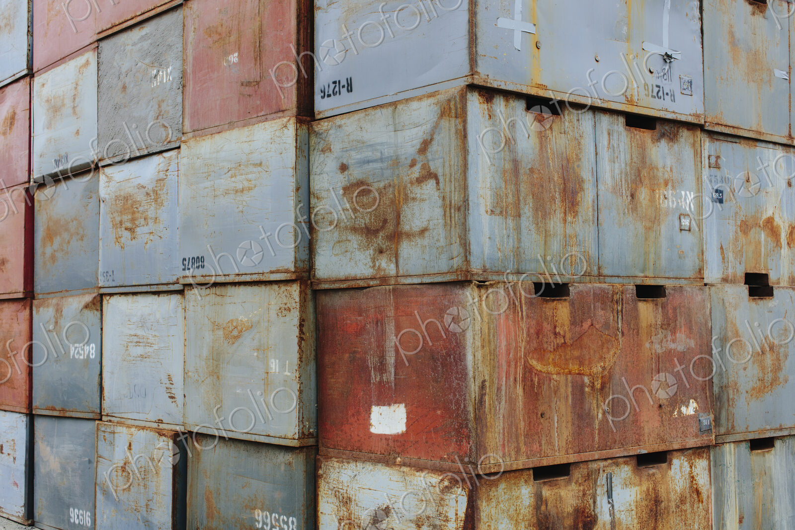Stack of rusty metal containers