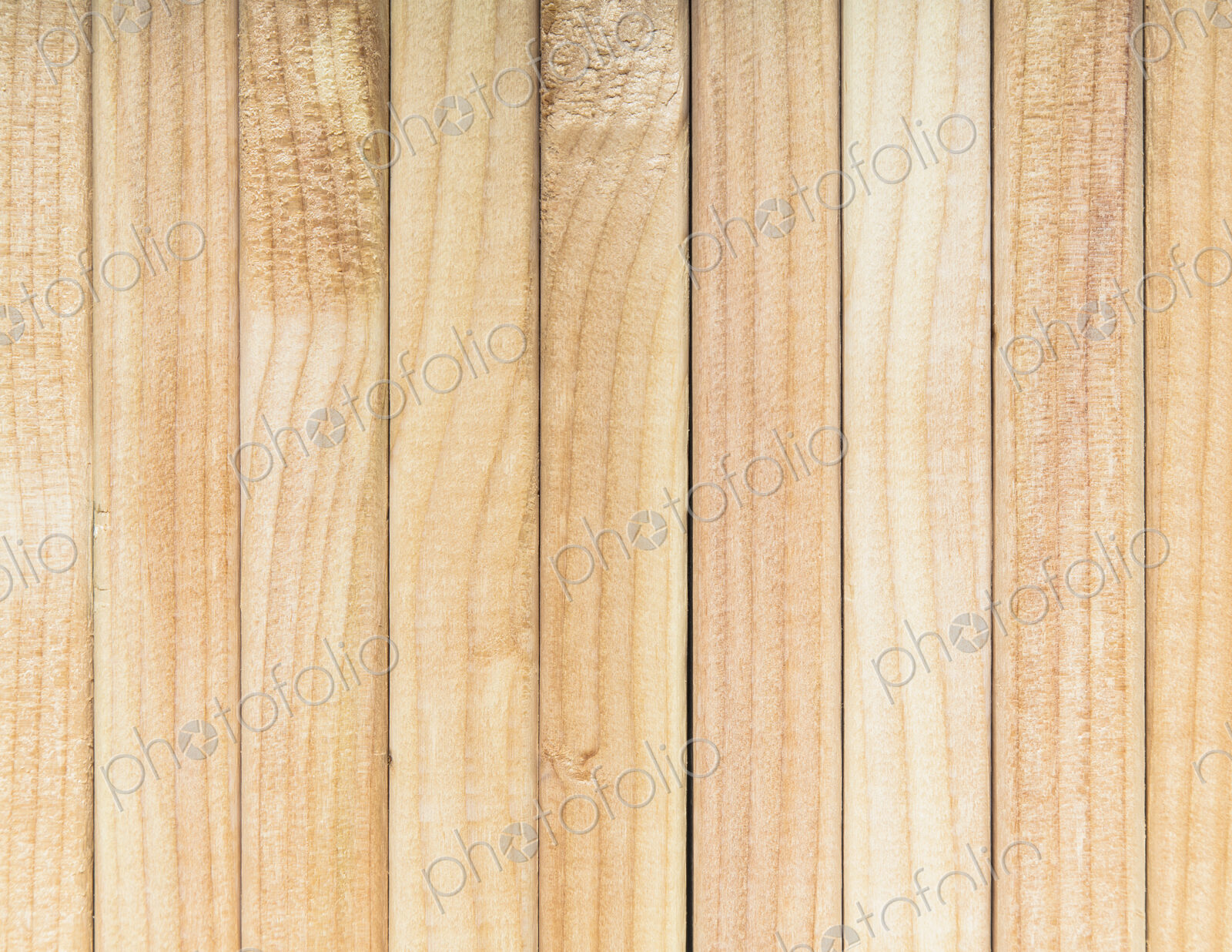 Stack of sawn prepared timber, spruce wood planks or studs, for use. Treated planed…