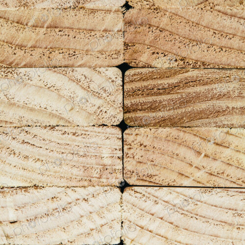 Stack of sawn prepared timber, spruce wood planks or studs, for use. Treated wood in… Stack of sawn prepared timber, spruce wood planks or studs, for use. Treated wood in…