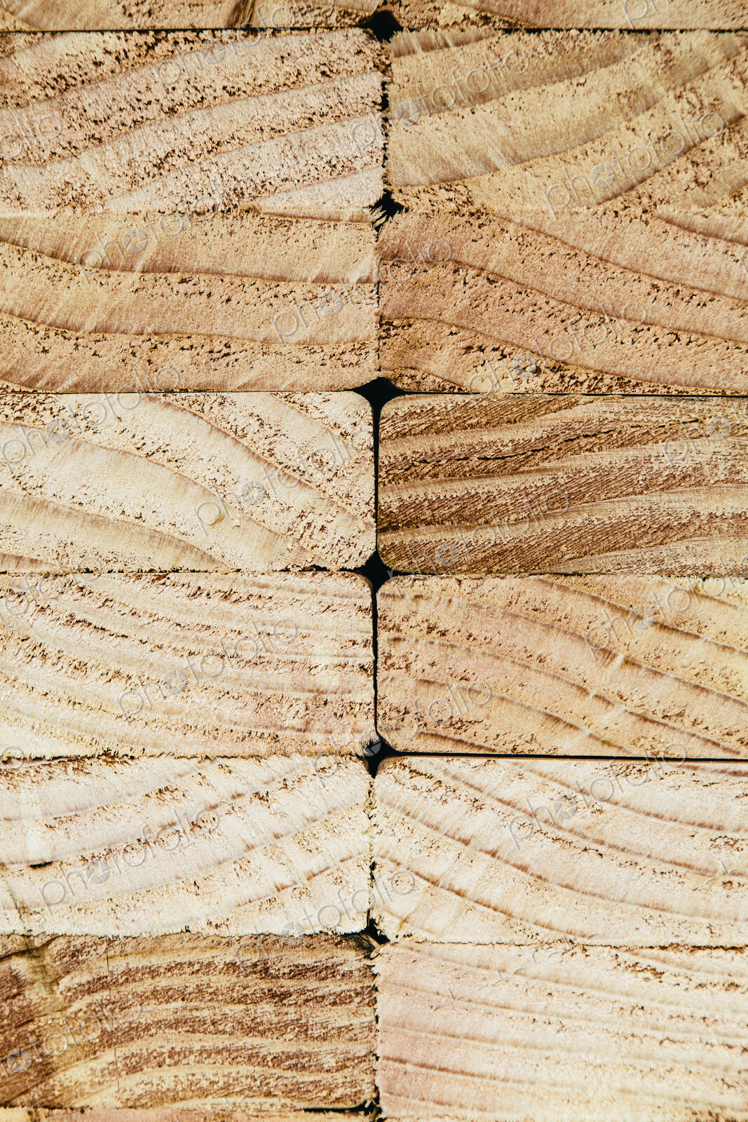 Stack of sawn prepared timber, spruce wood planks or studs, for use. Treated wood in…
