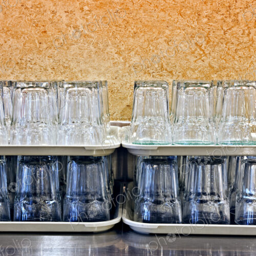 Stacked Glasses in a Cafeteria Stacked Glasses in a Cafeteria