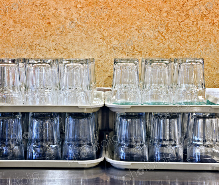Stacked Glasses in a Cafeteria