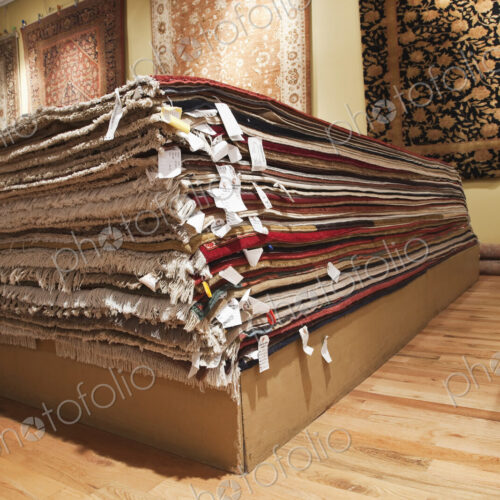Stacked rugs in shop Stacked rugs in shop