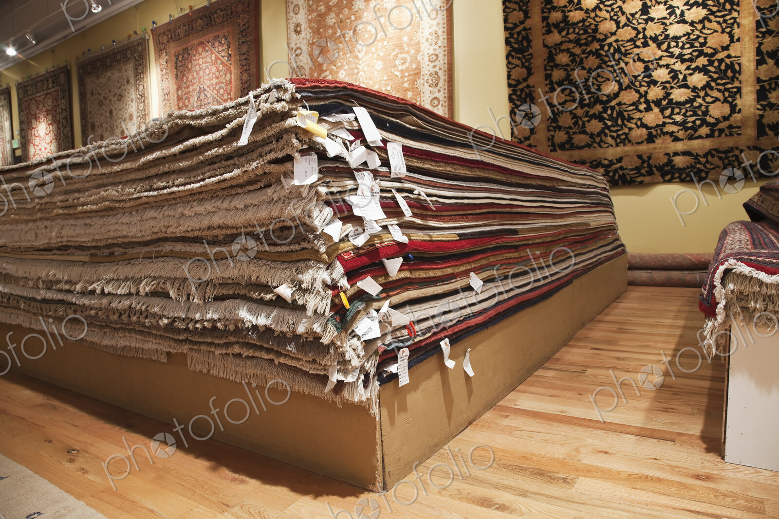 Stacked rugs in shop