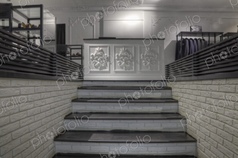 Staircase to counter in clothing store for men