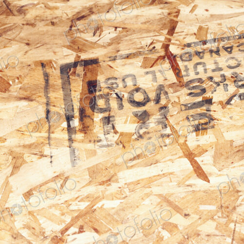 Stamp on composite wood surface.