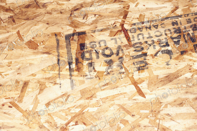 Stamp on composite wood surface.