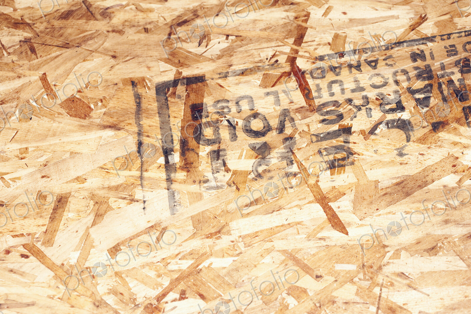 Stamp on composite wood surface.