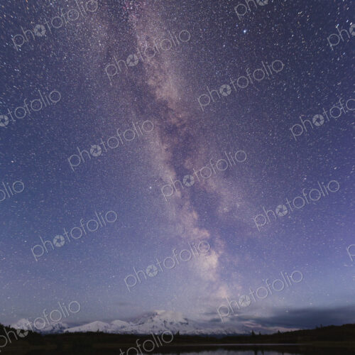 Starry sky over mountain and lake Starry sky over mountain and lake
