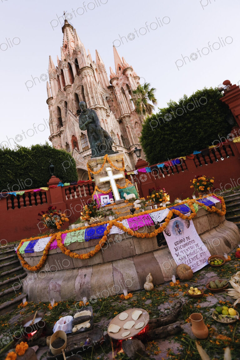 Statue of Fray San Miguel and Church.
