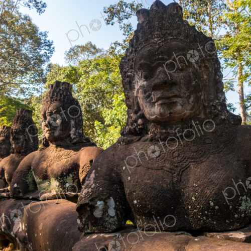 Statues at the entrance to Angkor Thom, Cambodia