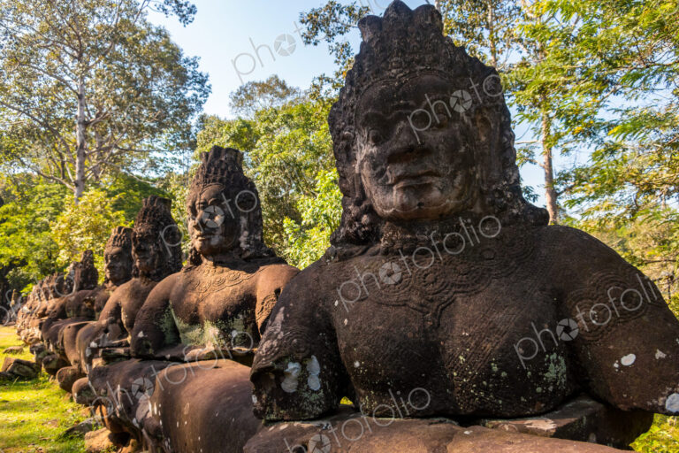 Statues at the entrance to Angkor Thom, Cambodia